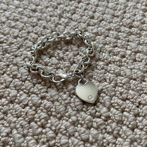 G by Guess brand silver heart toggle bracelet